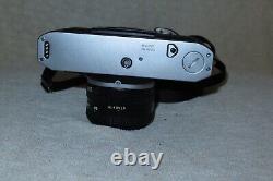 Canon AE-1 Program 35mm Manual SLR Film Camera with 50mm 11.8 Lens