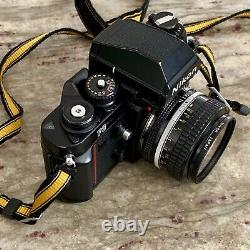 Nikon F3HP Film Camera + Nikkor 50mm f/1.4 Lens, L1A UV Filter, and Nikon Strap
