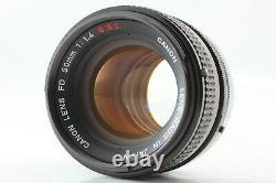 Appareil photo argentique Canon AE-1 Program 35mm + objectif FD 50mm f/1.4 S. S. C. en état proche du neuf, en provenance du Japon
