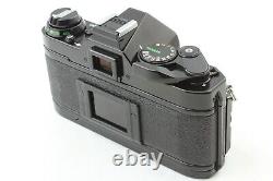 Appareil photo argentique Canon AE-1 Program 35mm + objectif FD 50mm f/1.4 S. S. C. en état proche du neuf, en provenance du Japon