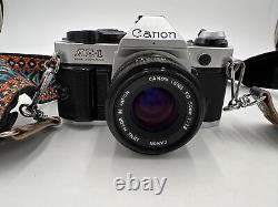 Appareil photo argentique Canon AE-1 Program SLR avec objectif 50mm f1.8 TESTÉ FONCTIONNE