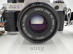 Appareil photo argentique Canon AE-1 Program SLR avec objectif 50mm f1.8 TESTÉ FONCTIONNE