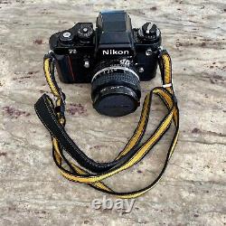 Appareil photo argentique Nikon F3HP + objectif Nikkor 50mm f/1.4, filtre UV L1A et sangle Nikon