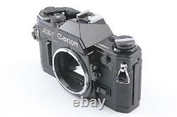 Appareil photo reflex argentique Canon AE-1 35mm en état proche du neuf avec objectif FD 50mm f1.4 noir - JAPON